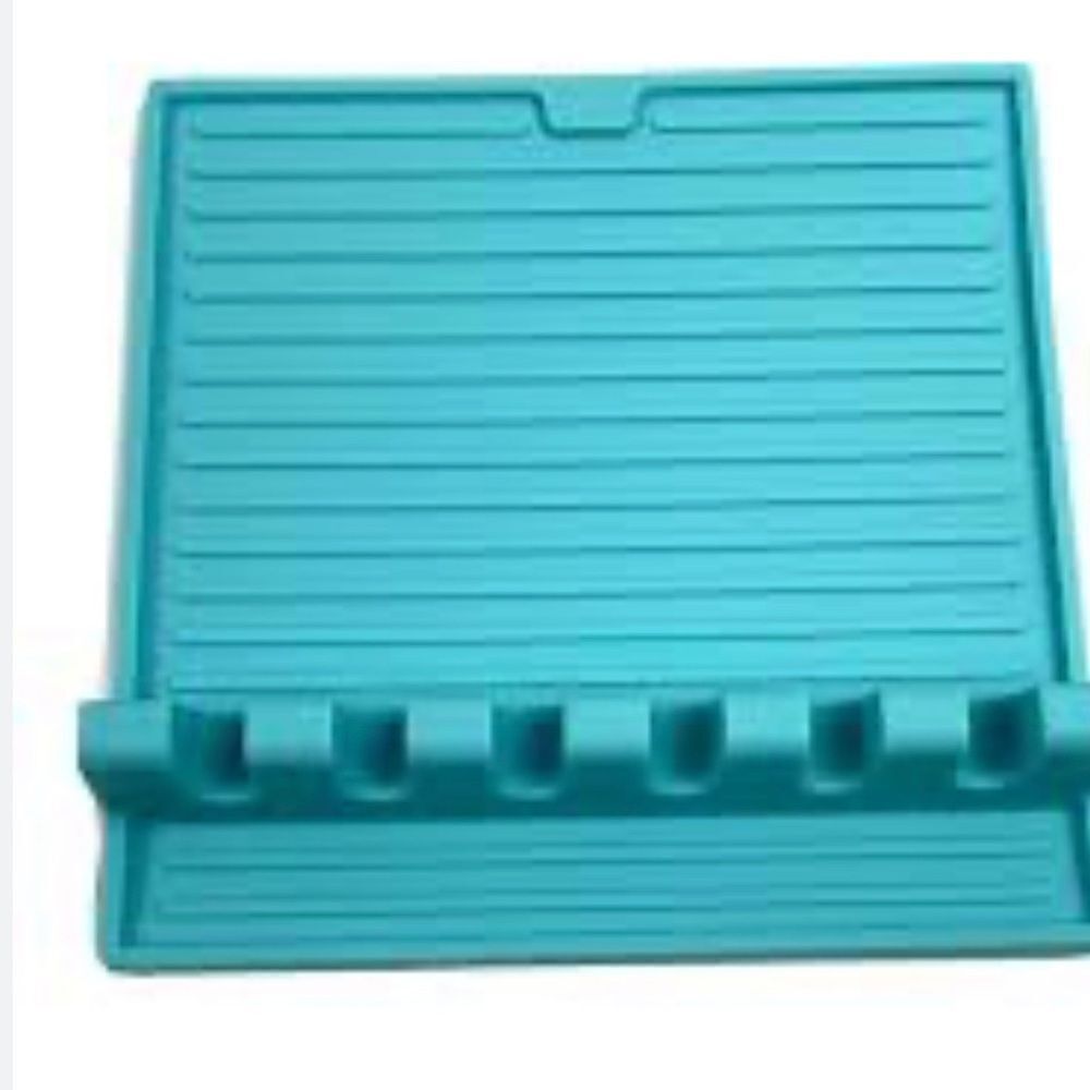 Non-slip utensil spoon rest. NWOT teal blue